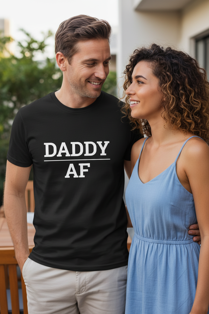 Attractive white man wearing black DADDY_AF t-shirt, woman smiling at him
