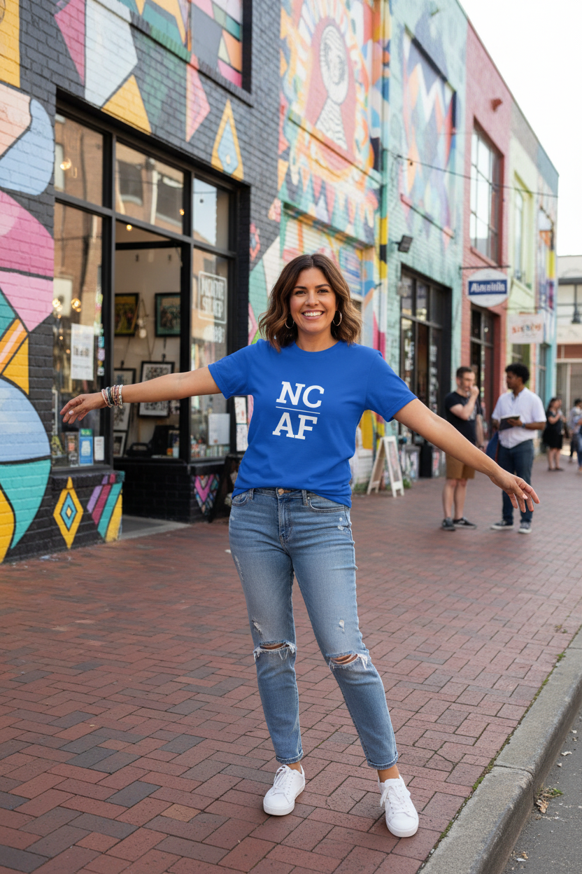 Person wearing blue North Carolina t-shirt in Asheville's River Arts District