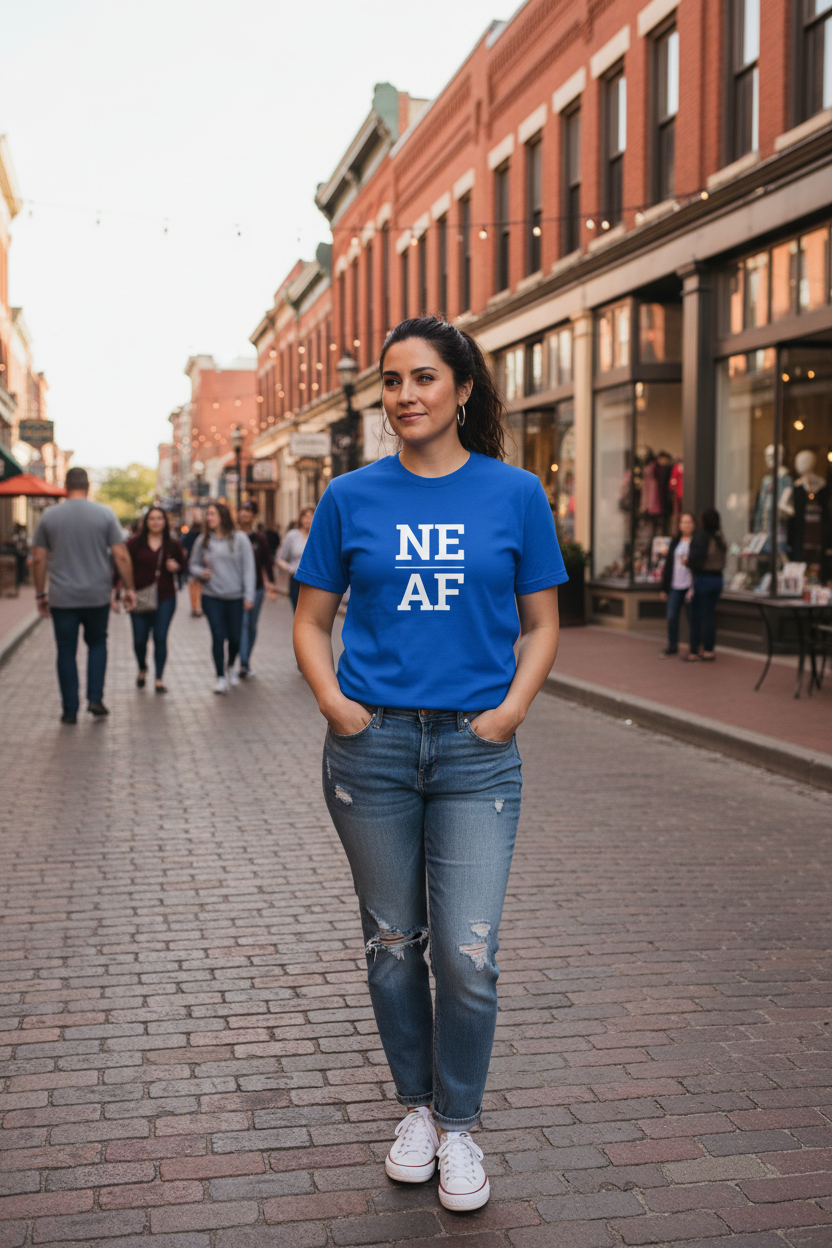Person wearing blue Nebraska t-shirt in the Omaha Old Market
