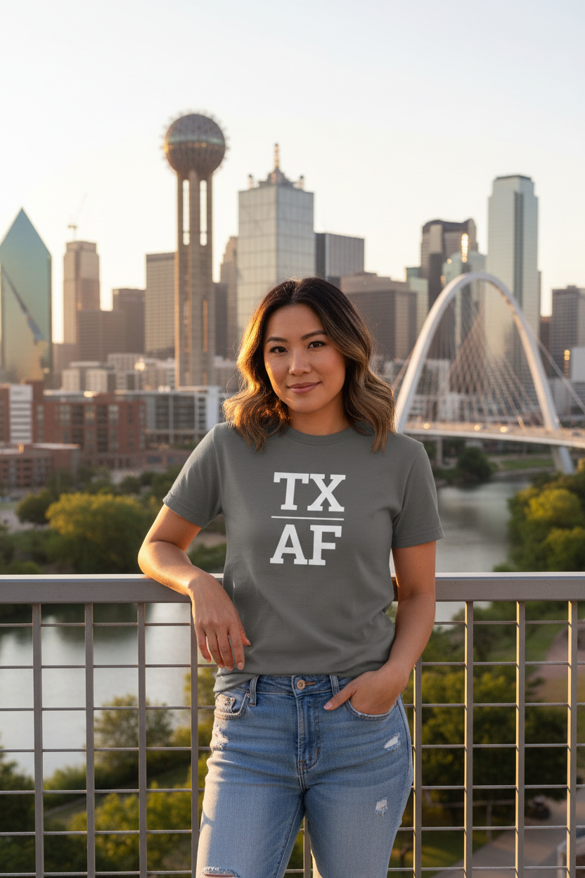 Person wearing grey Texas t-shirt with the Dallas skyline