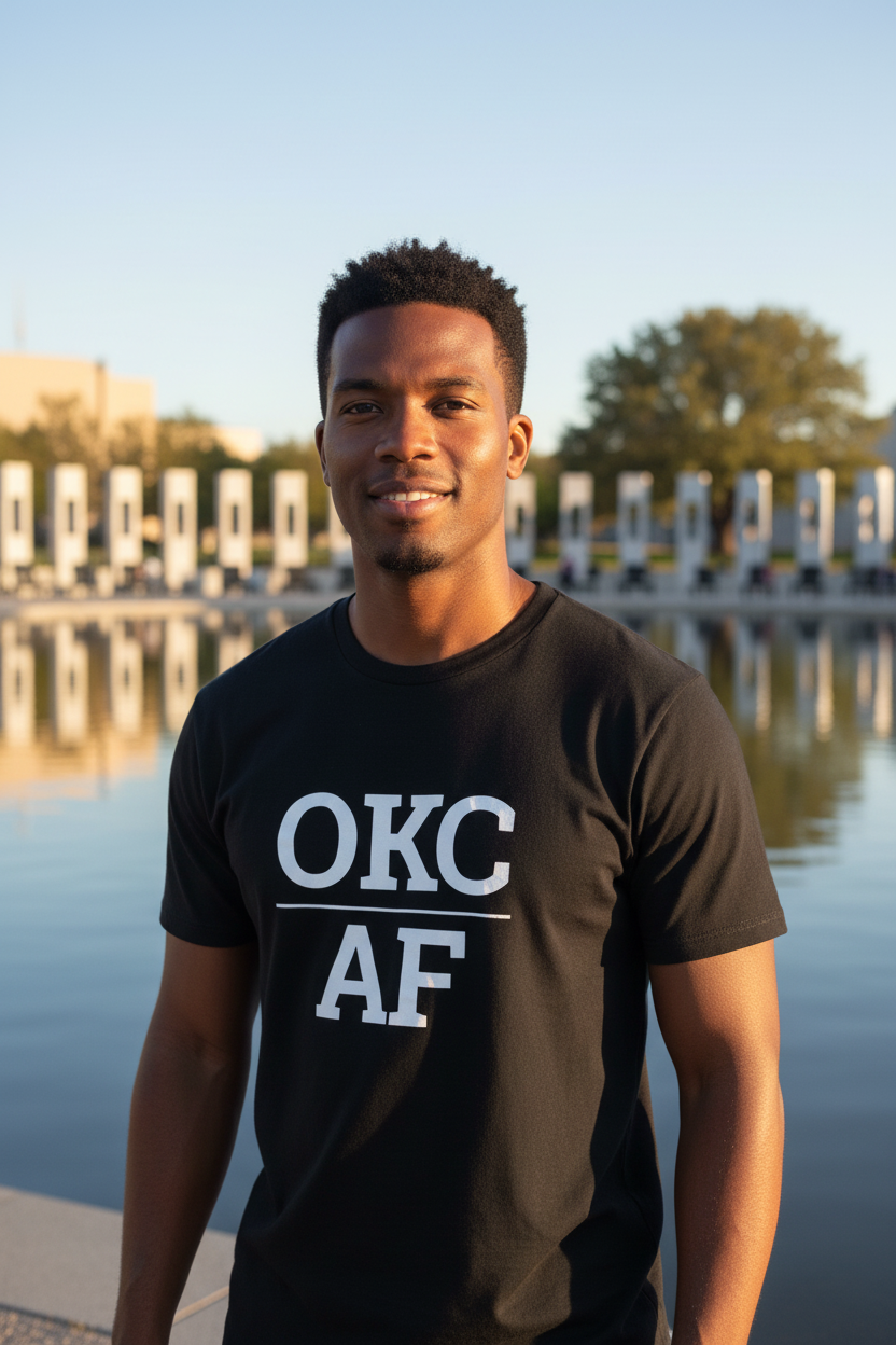 Black man wearing black OKC_AF t-shirt at Oklahoma City National Memorial