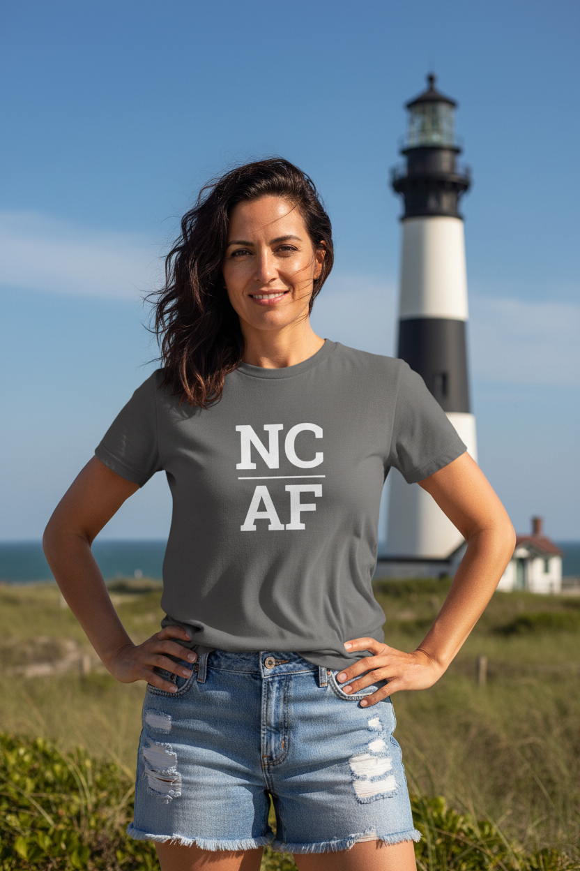 Person wearing grey North Carolina t-shirt at Cape Hatteras Lighthouse